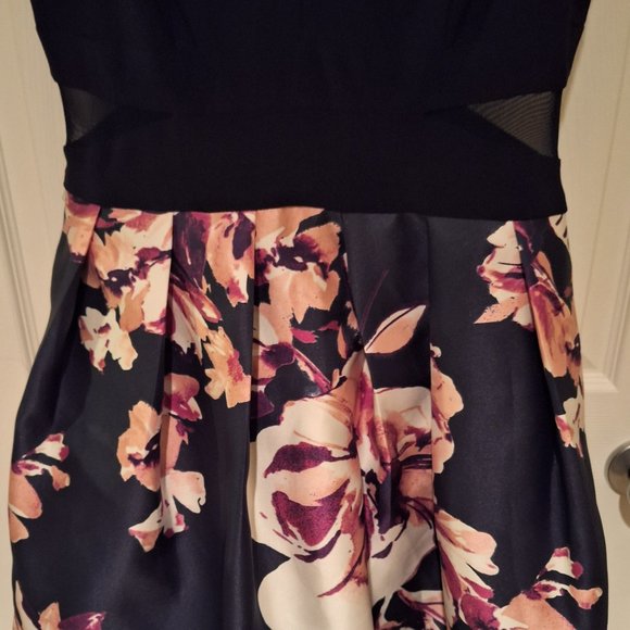 Navy Blue Tea Length Dress with Mesh Cut Outs and Floral Skirt - Picture 3 of 9